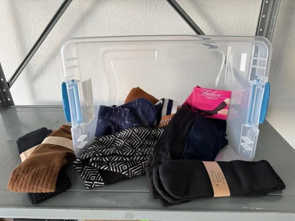 Storage tote of gripper, trouser, knee socks