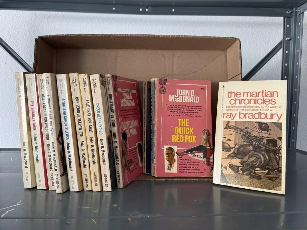 Box of paperback books