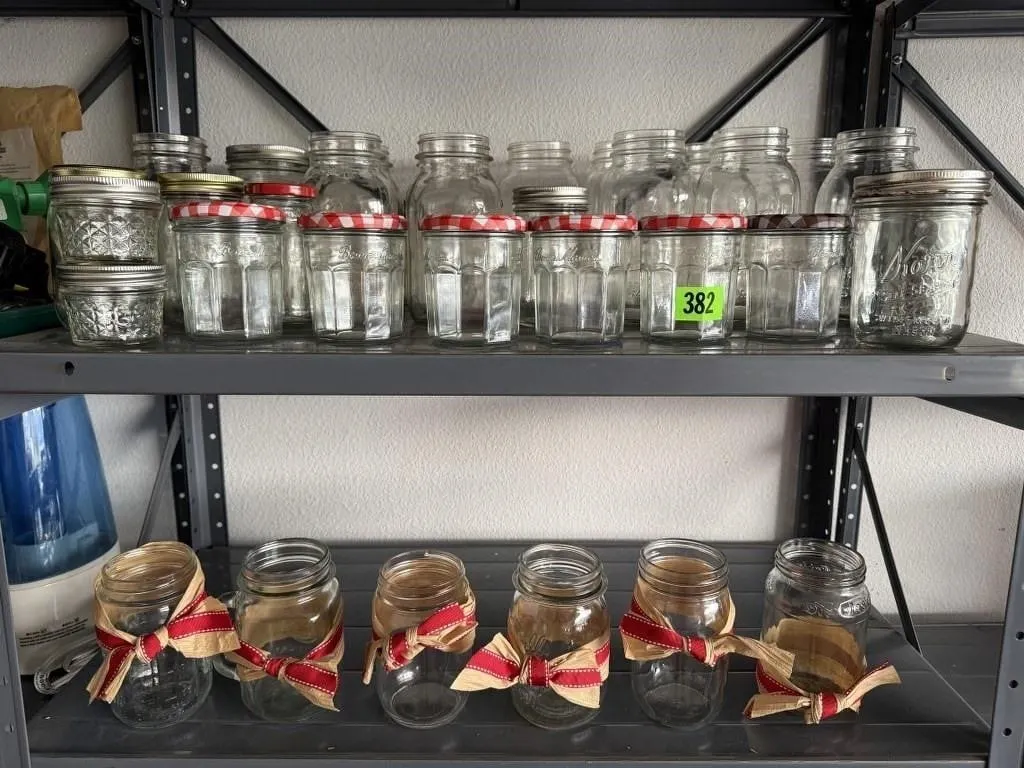 Shelf of canning jars, book