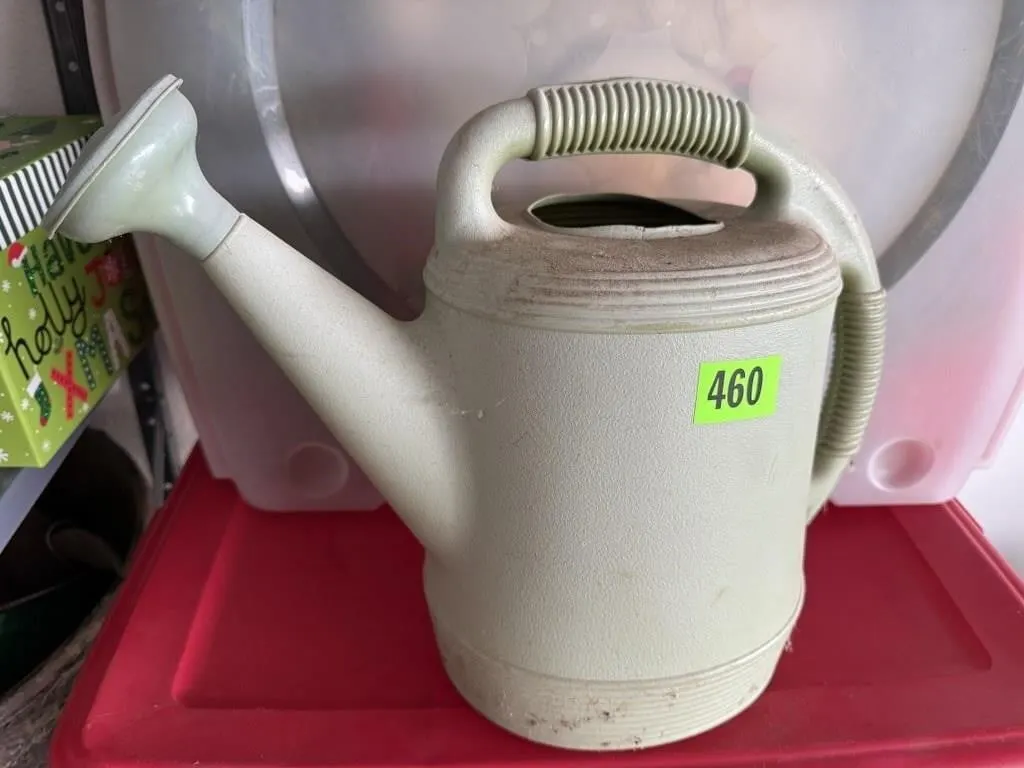 Plastic watering can