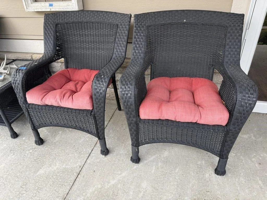 Black wicker patio chairs (2), cushions