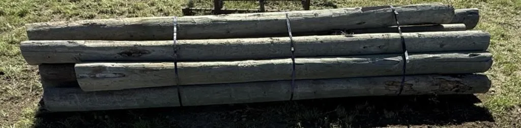 Bundle of 5"-7" x 9'-12' Treated Blunt Posts