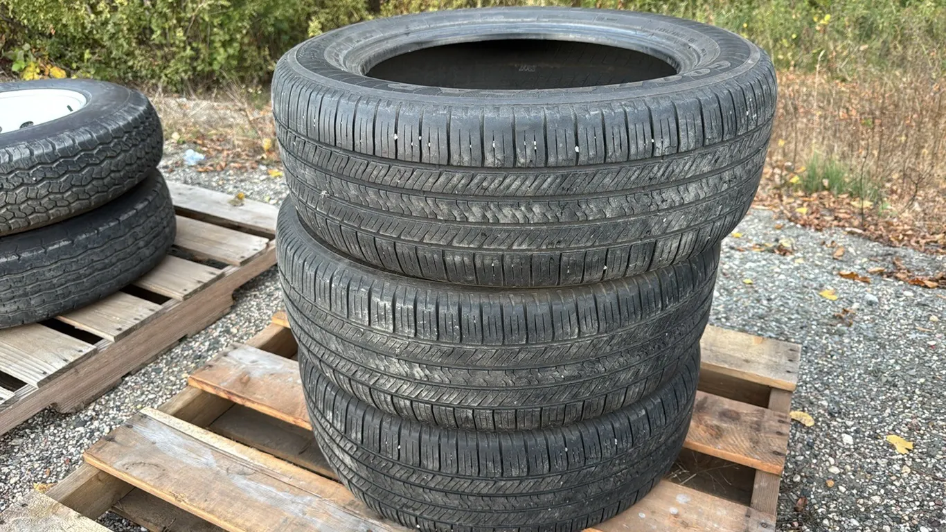 3) Goodyear P225/55R17 tires