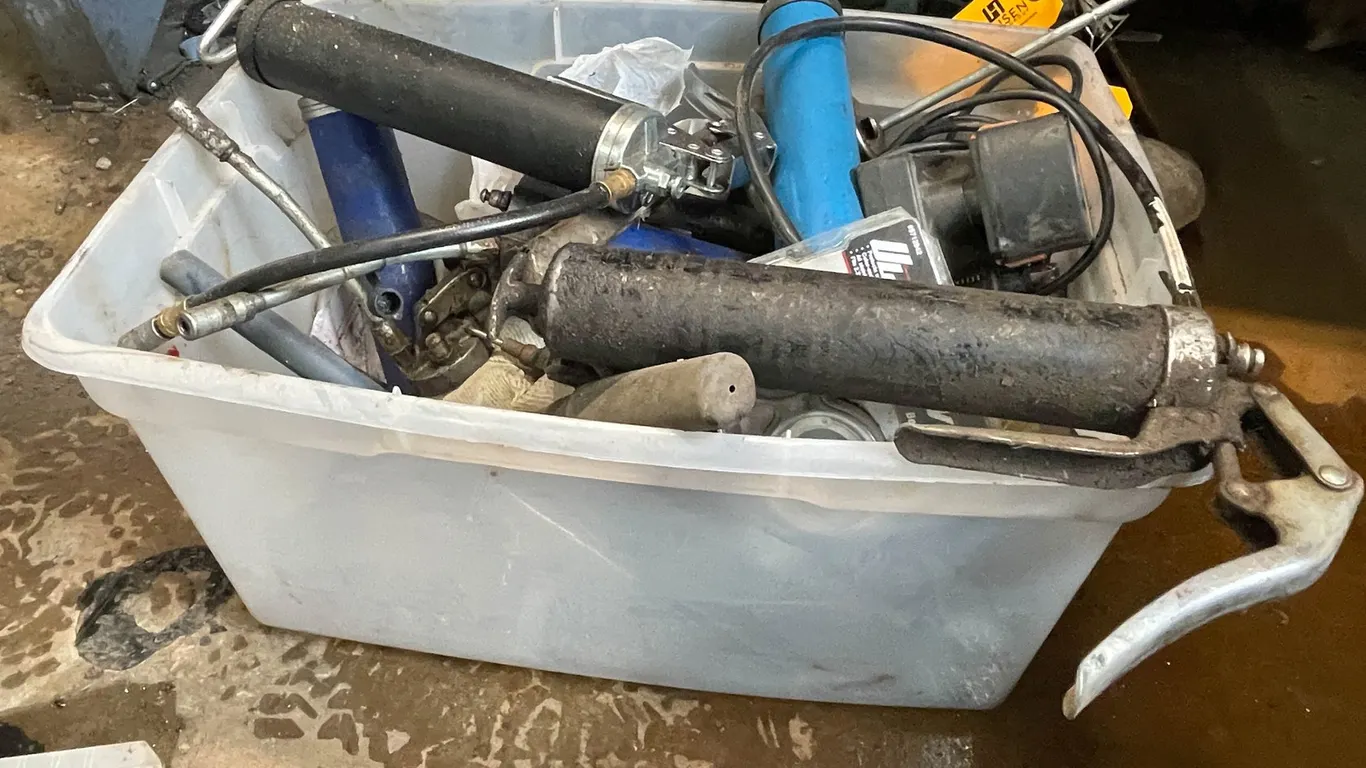 Bin of Grease Guns