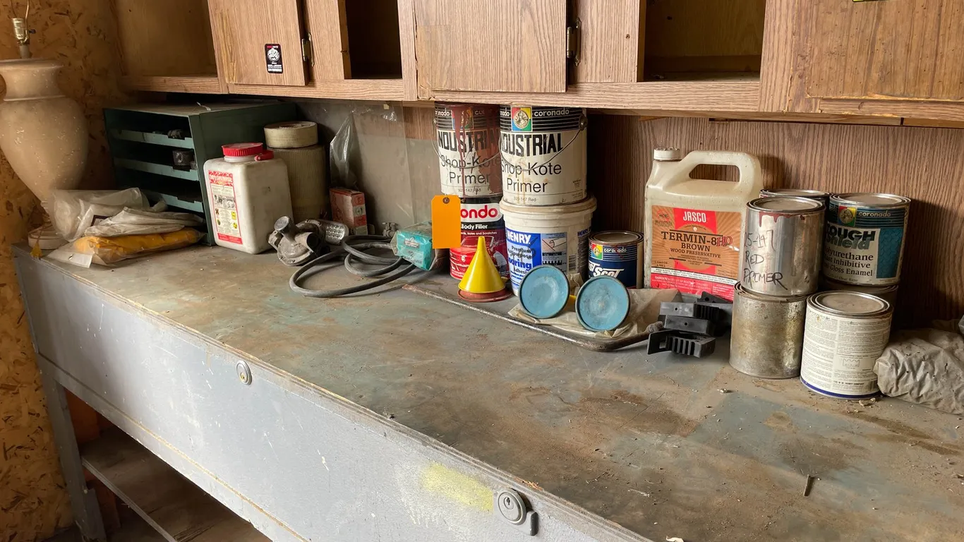 Contents on top of Gray Bench