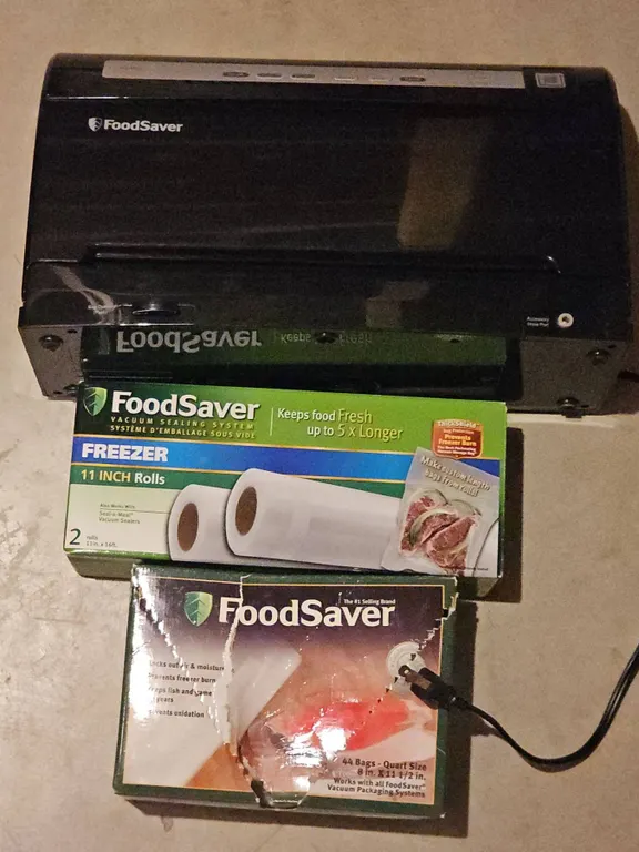 FoodSaver Vacuum Sealer with Freezer Rolls and Quart Size Bags