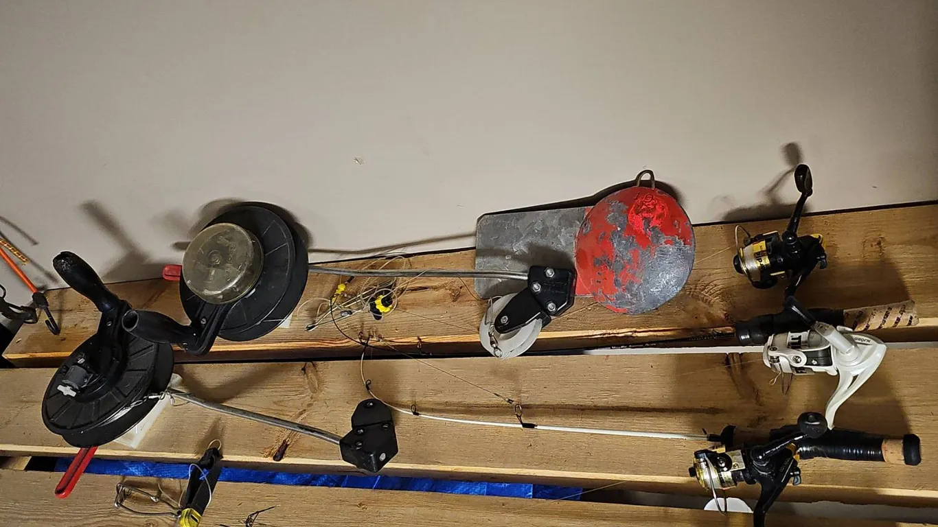 Large Fishing Lot With Rods, Reels, Tip-Ups, Subzero Gear, Lures, and Tackle