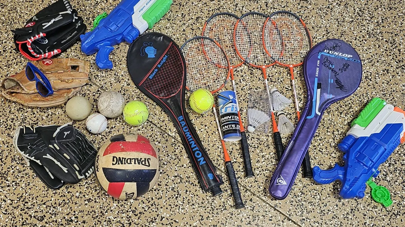 Sports Lot: Baseball Gloves, Badminton Rackets, Volleyball, Water Guns
