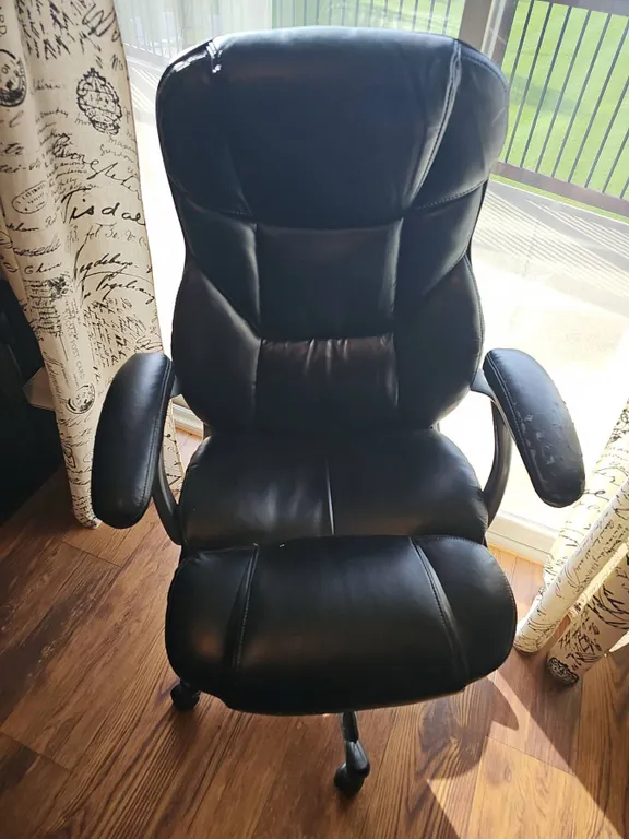 Black Faux Leather Executive Office Chair with Swivel Base and Worn Armrests