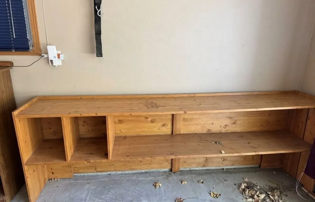 Large Wooden Workbench with Storage Shelves and Compartments