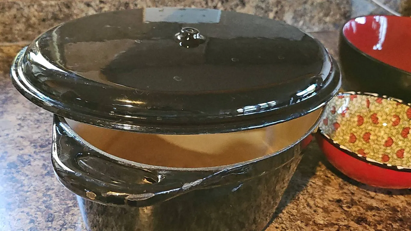 Red and Black Bowls with Decorative Bowls and Black Enamel Cast Iron Dutch Oven