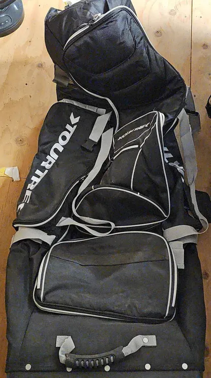 TourTrek Black Duffel Bag with Shoulder Strap and Multiple Zippered Compartments