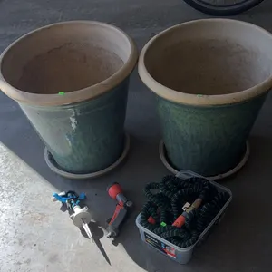 Two Glazed Ceramic Planters with Saucers, Expandable Hose, and Garden Nozzles