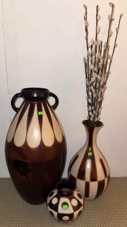 Three Brown and Cream Patterned Ceramic Vases