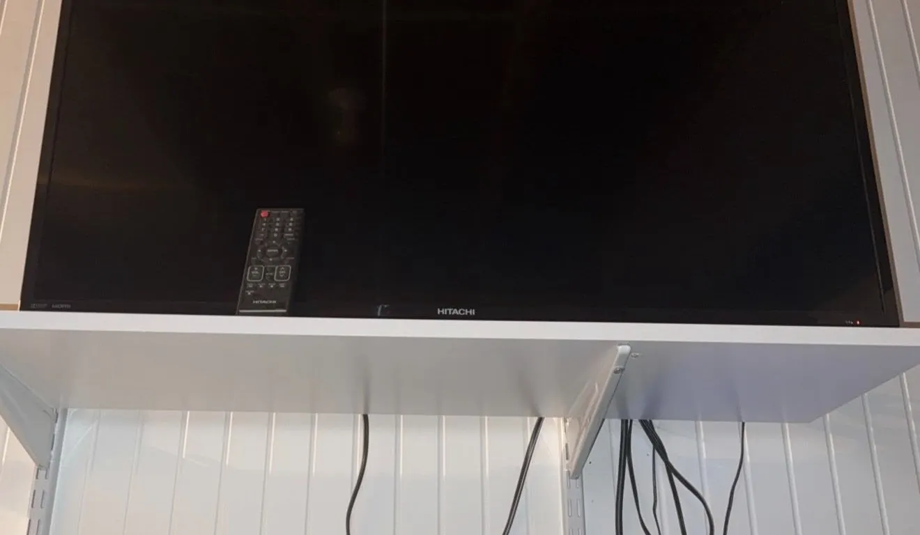 Hitachi LCD Television with Remote and HP Blu-ray Player