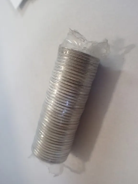 1999 Canadian “A Country Unfolds” Millennium Quarter Roll – Uncirculated