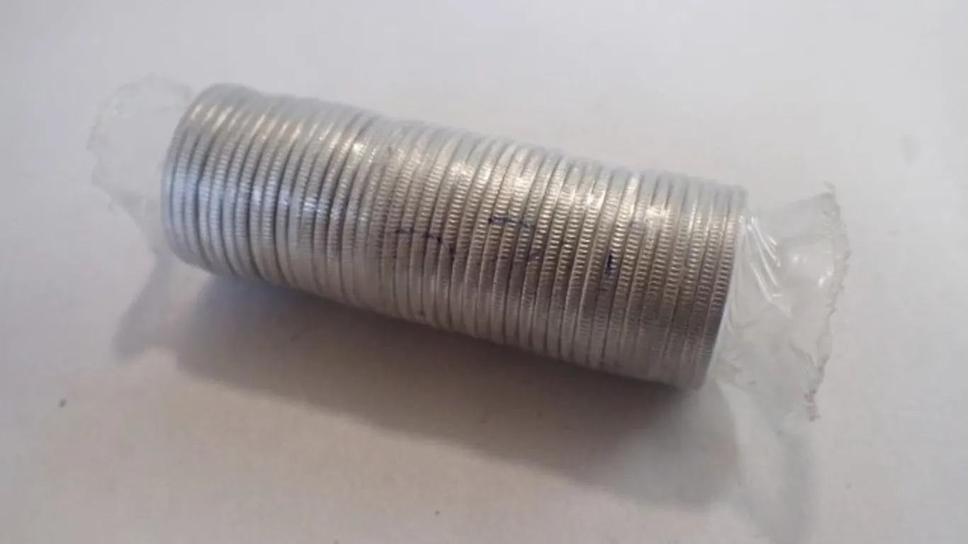 2000 Canadian “Community” Millennium Quarter Roll – Uncirculated