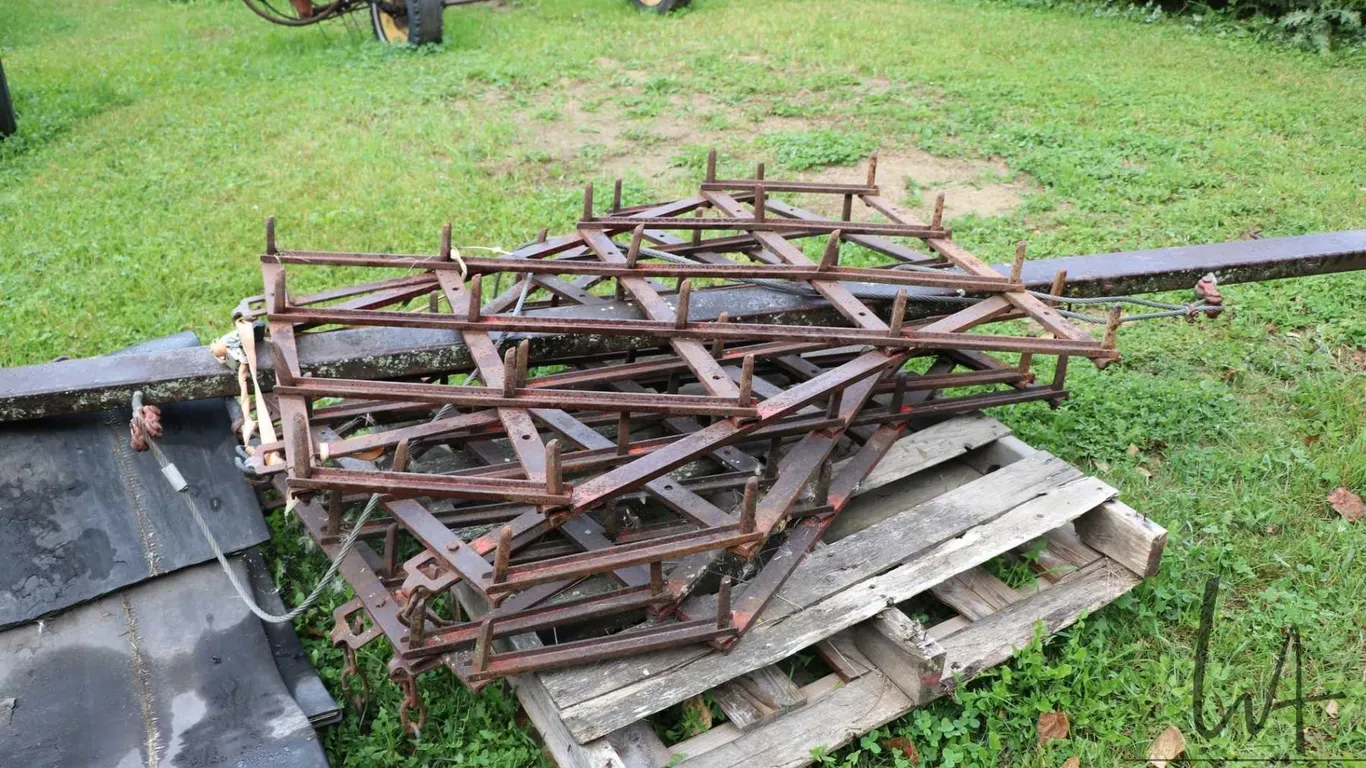 Four section drag harrow with 10' draw bar