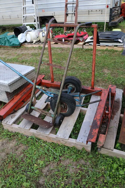 Dolly for handing large wheel on shop floor plus other dollies