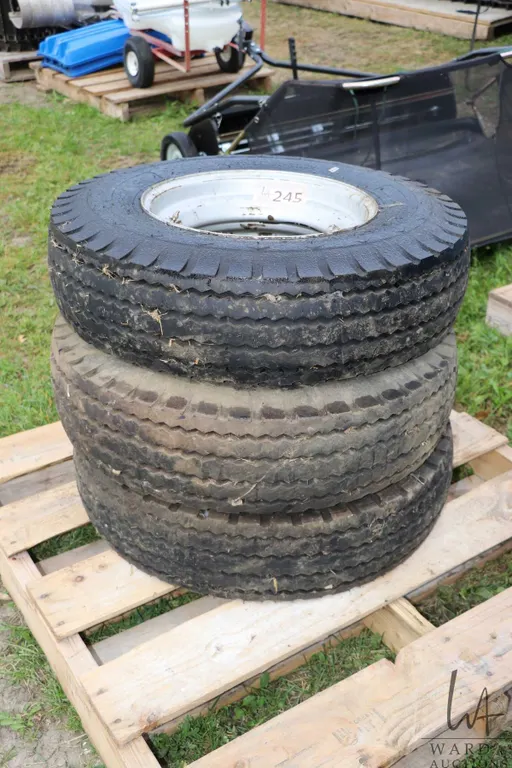 Three rims fitted with Goodyear Traction Hi-Miler 8-14.5LT tires