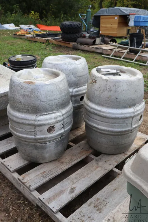 Three aluminum beer kegs