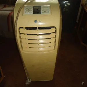 (2) LG Room Air Conditioners, (1) Window Frigidaire and TV