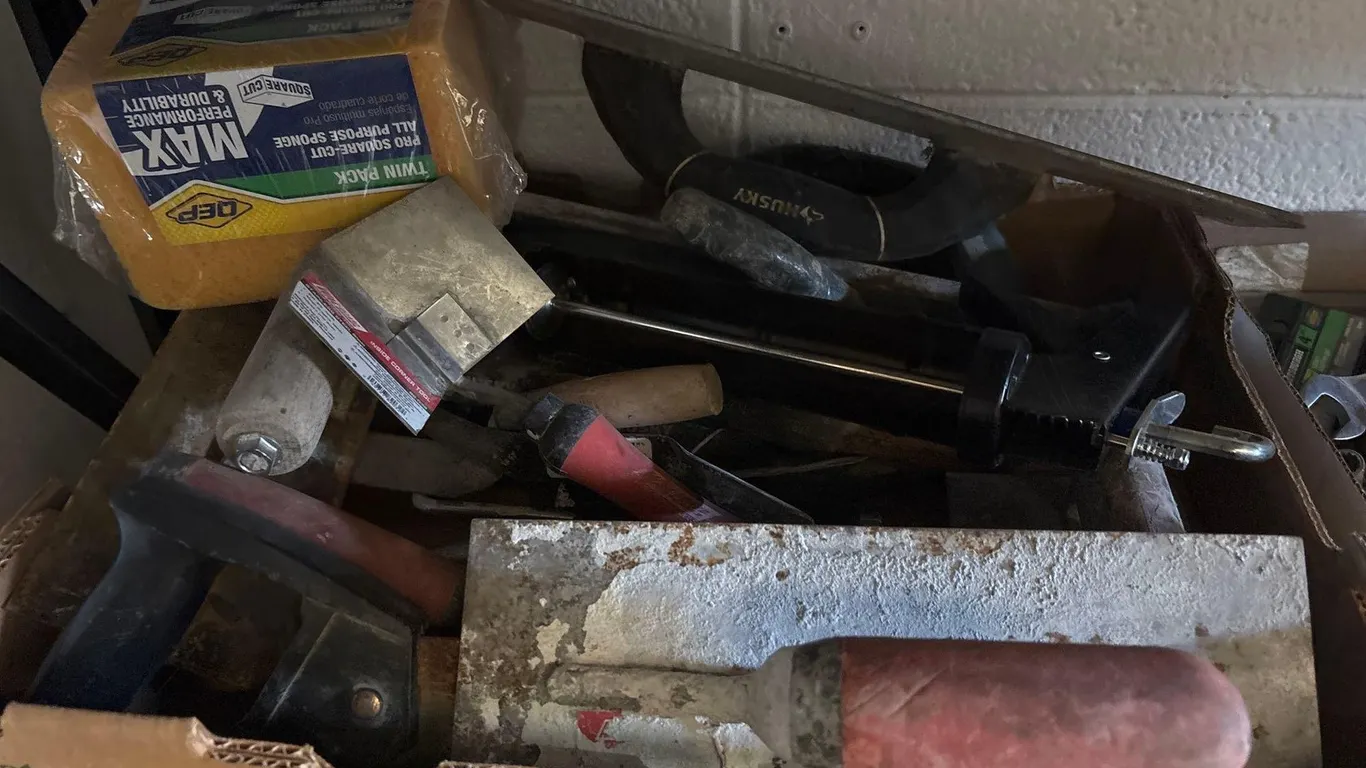 LOT OF TROWELS, SPONGES AND CAULK GUNS