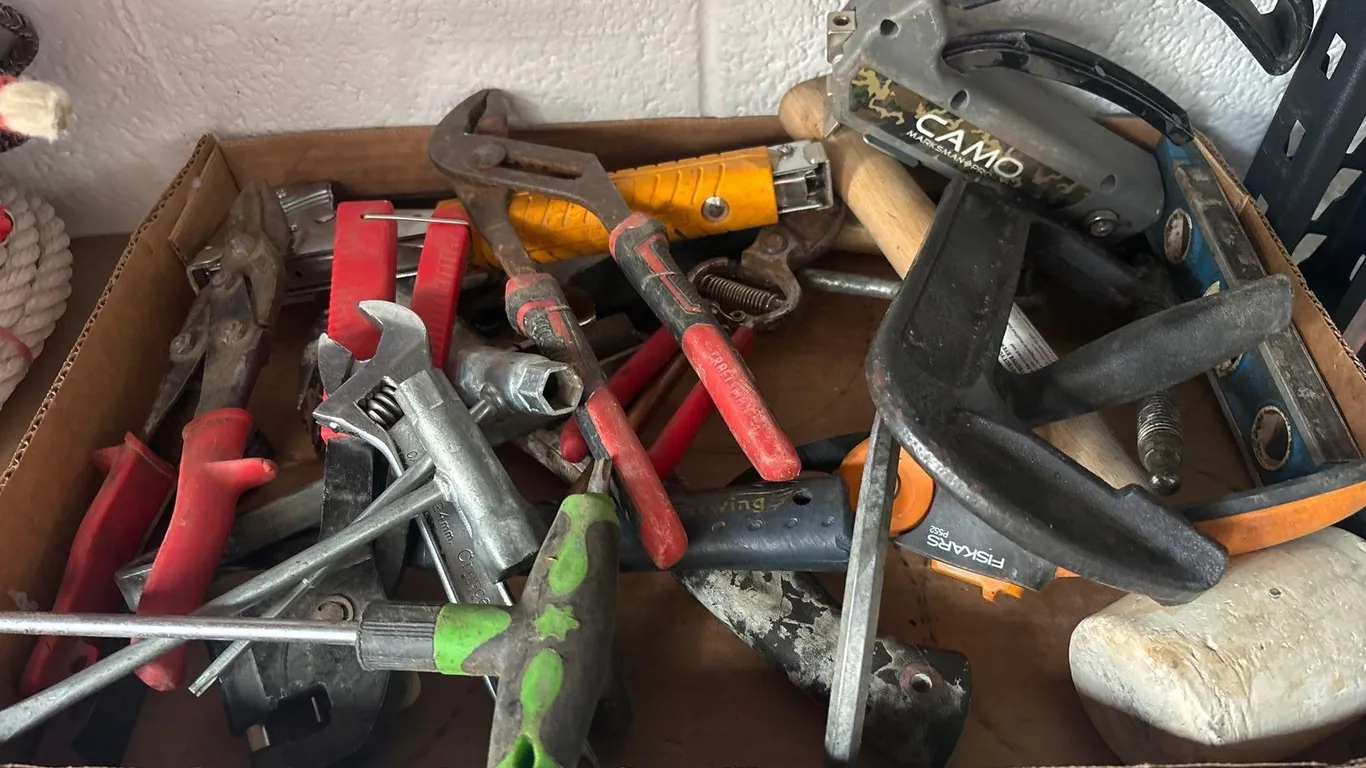 SELECTION OF TOOLS INCLUDING PLIERS, C-CLAMPS, HAMMERS, STAPLE GUNS