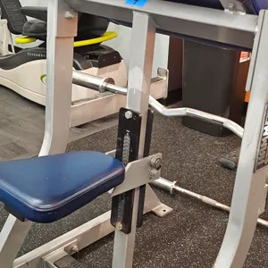 Hammer strength seated preacher curl, (Included blue wrap to fix upholstery)