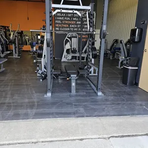 Power lift dual cage. Squat, bench, etc. for maximizing space while 2 people can be using on each side! 45 lbs. bar and all attachments include beside