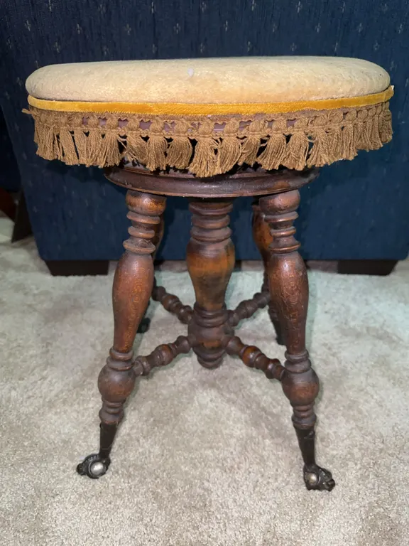 Antique piano stool with marble claw feet