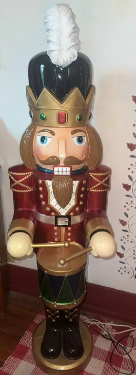 60 inch high Nutcracker-place the drums, lights up and plays music