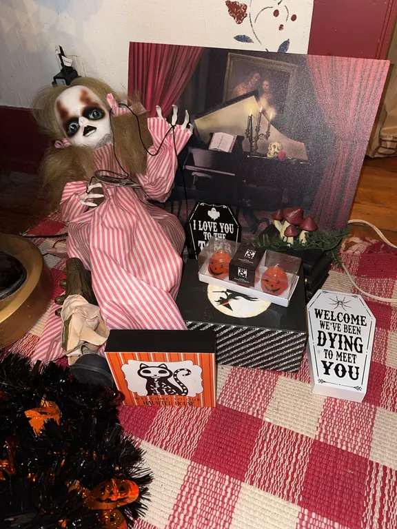 Creepy Halloween decor and animated doll