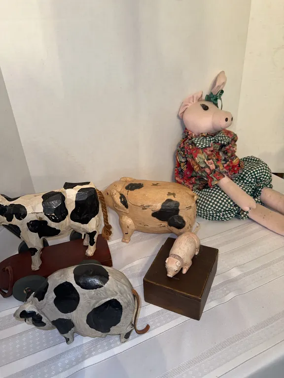 Hand carved wood pig and cow, etc.