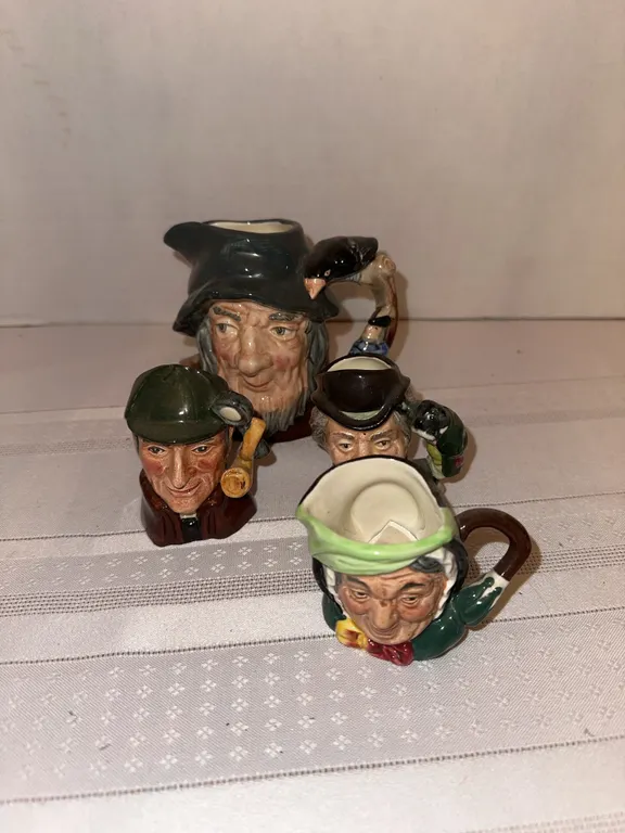 Four Royal DOULTON Toby mugs
