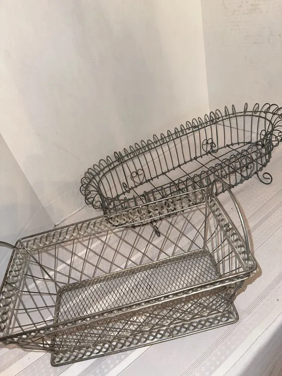 Two metal baskets