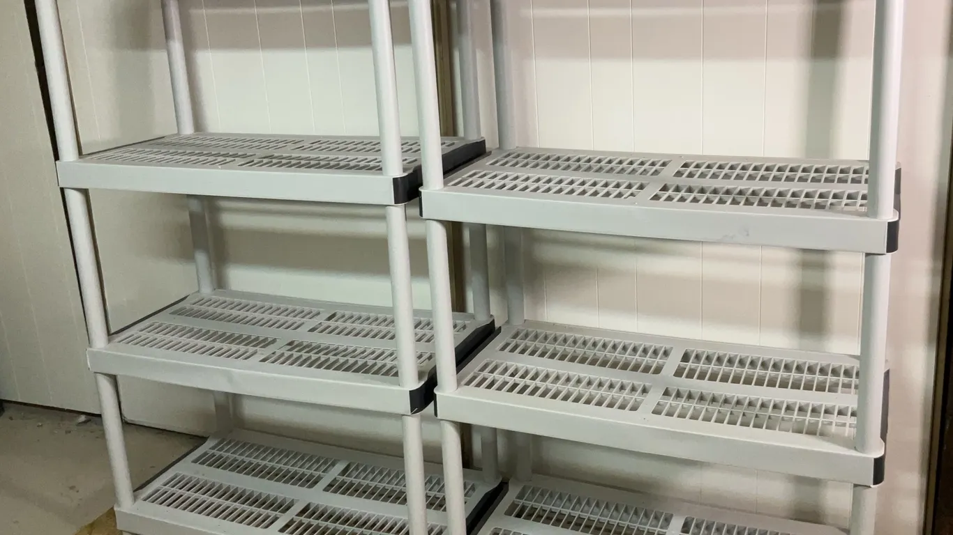 Two Plastic Storage Shelving Units