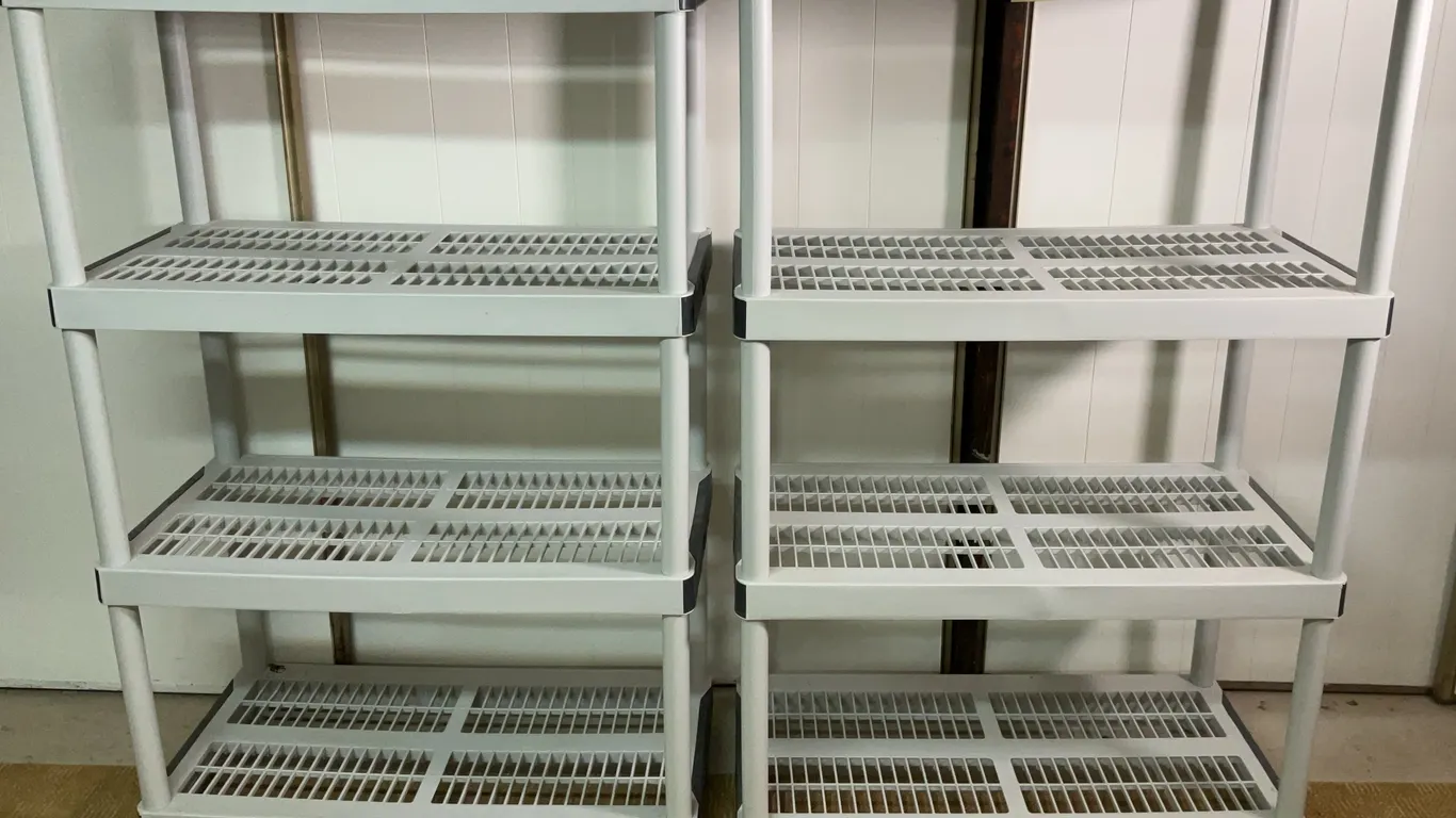 Two Plastic Storage Shelving Units
