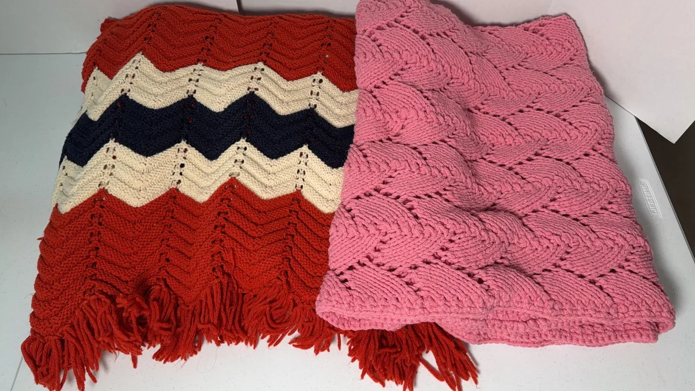 Pair of Vintage Handmade Knit Afghans, Pink Textured & Red Chevron Fringe Throws