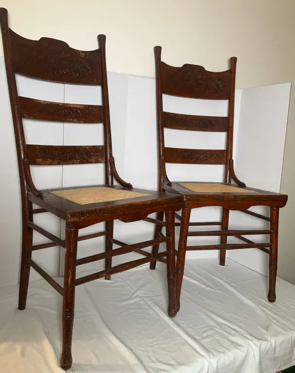 Victorian-Style Ladder Back Chairs Featuring Woven Cane Seats & Ornately Carved Floral Slats 