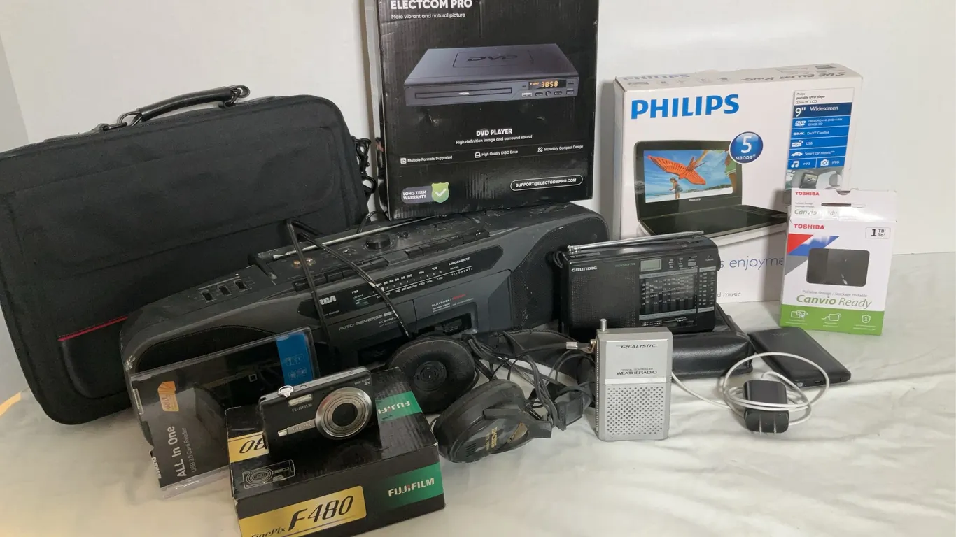 Assortment of Electronics, RCA Cassette Player, Fuji Camera, Philips Portable DVD Player & More
