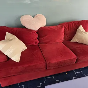 Red Couch with pillows