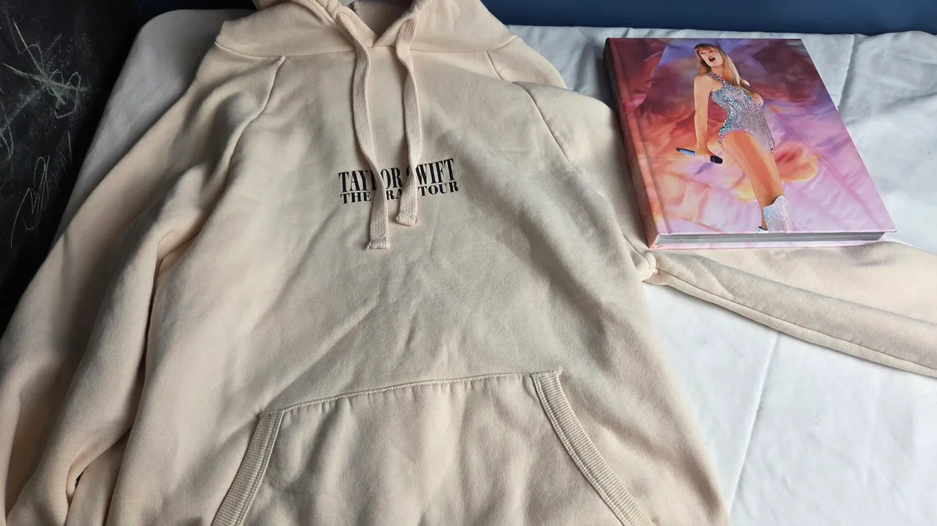 Taylor Swift concert hoodie and book