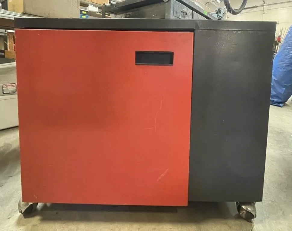 Rolling metal cabinet. Approx. 27� x 22� x 22�.
