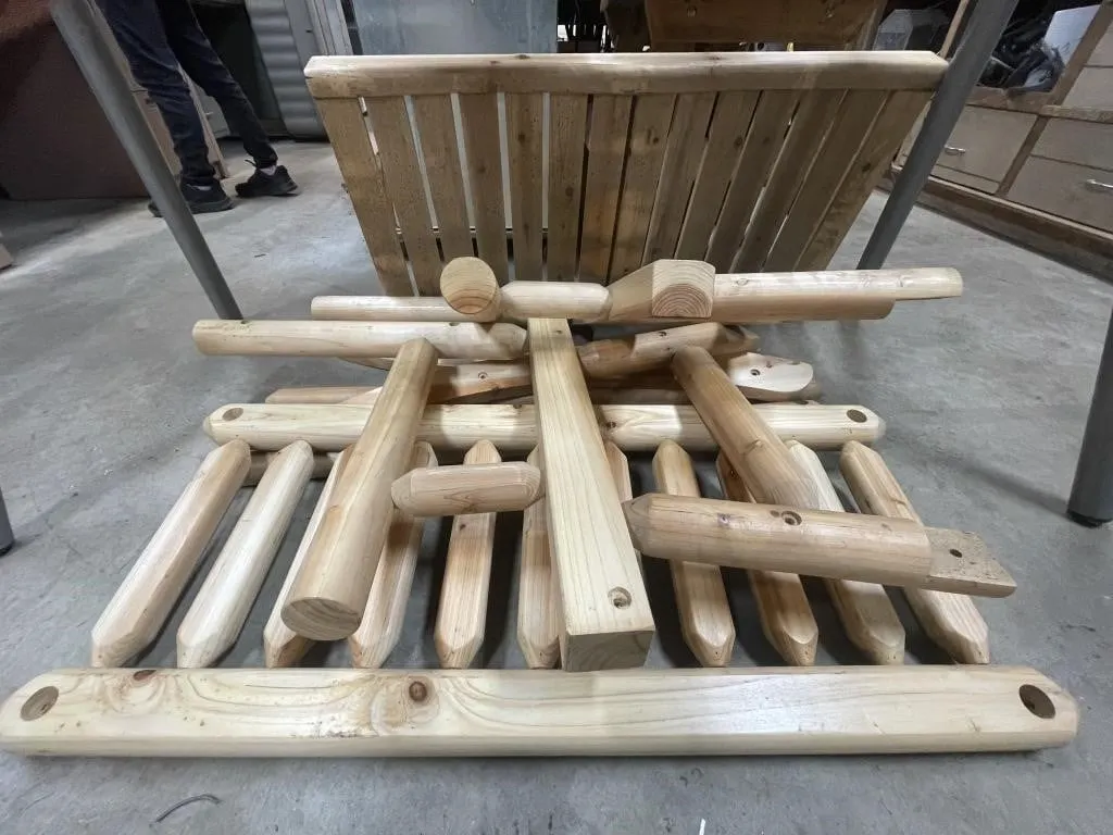 Partially assembled wooden rocking