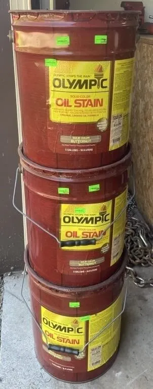 Three unopened 5-gallon metal pails of Olympic