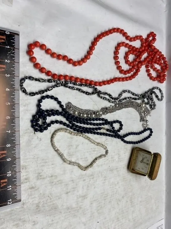 Assorted beaded necklaces, bracelet & travel clock
