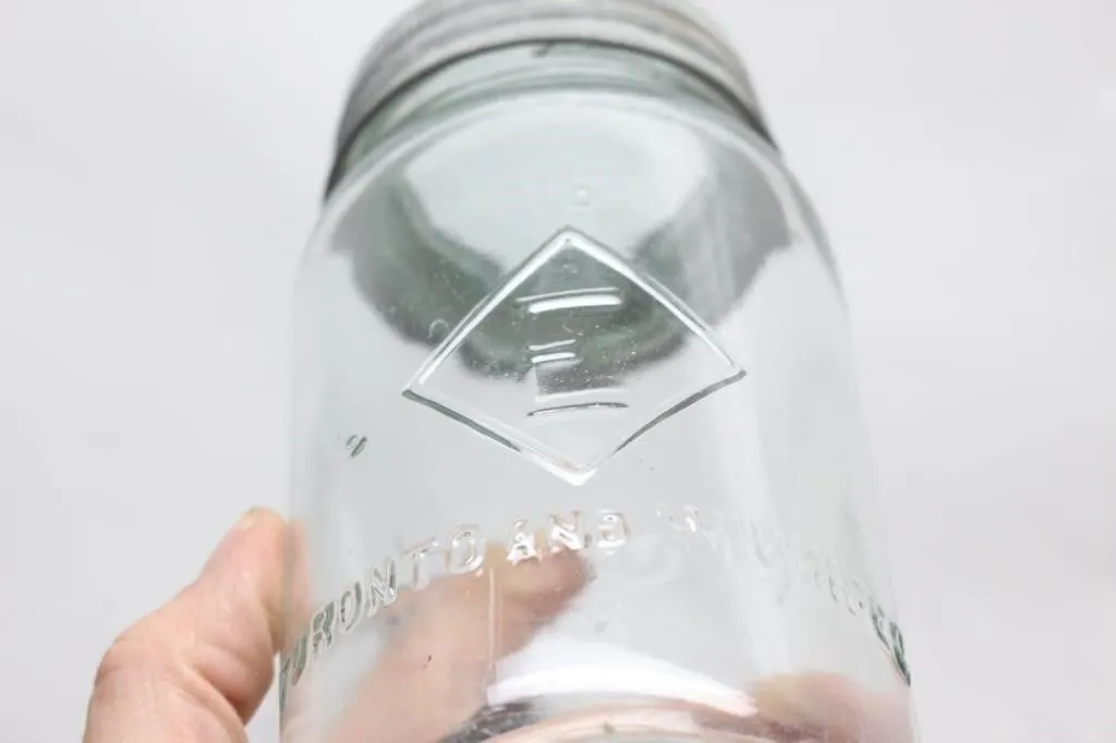 Antique Eatons Crown quart mason jar with zinc lid