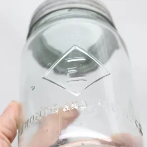 Antique Eatons Crown quart mason jar with zinc lid