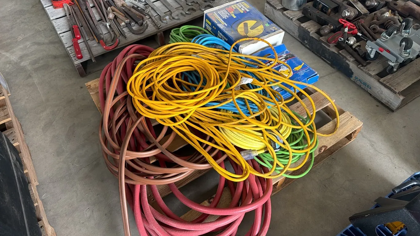 Unused Rite-Lite 30' power cord reel w/ assorted power cords & garden hose